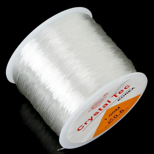 0.6mm transparent white, about 80 meters/roll,chaincharmsupply.com