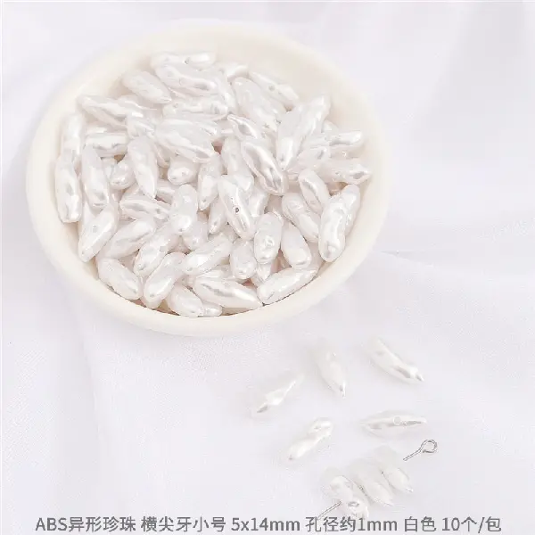 #15 transverse fangs, size 5×14mm, hole diameter about 1mm, 10 pcs-white,chaincharmsupply.com