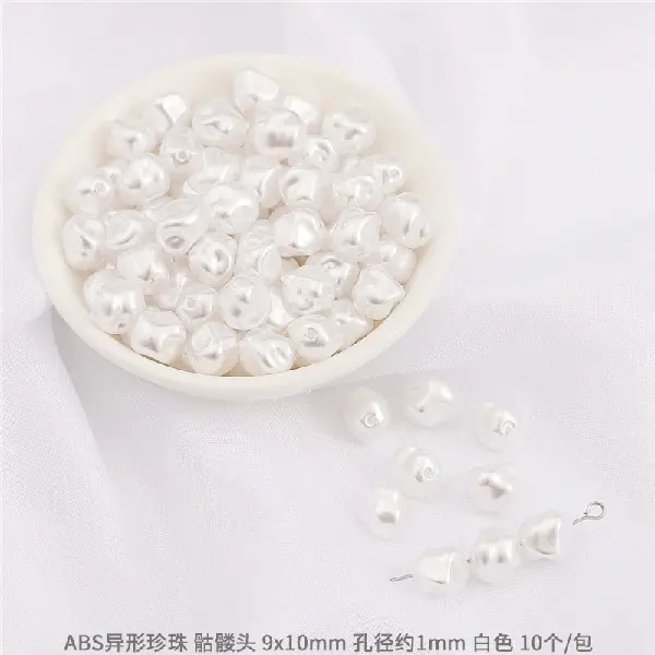 #18 Skull size 9×10mm hole diameter about 1mm 10 pieces - white,chaincharmsupply.com