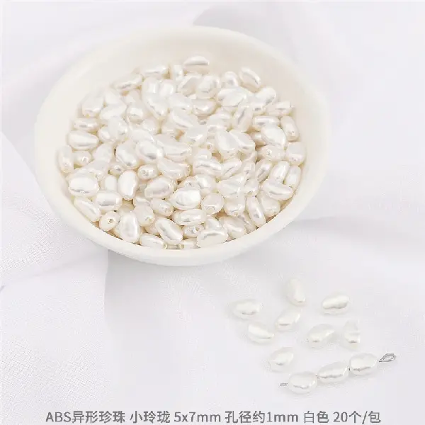 #23 Xiaolinglong size 5×7mm hole diameter about 1mm 20 pieces - white,chaincharmsupply.com