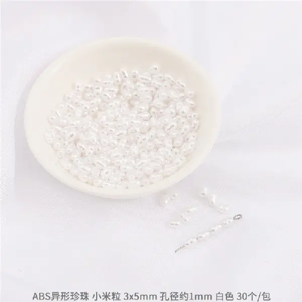 #27 Millet grain size 3×5mm, hole diameter about 1mm, 30 pieces/pack-white,chaincharmsupply.com